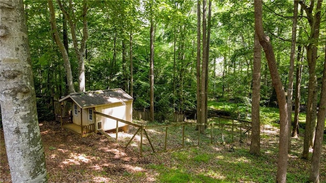 1721 Abbottsford Dr, Kernersville, NC 27284 - view of yard featuring an outbuilding and a forest view