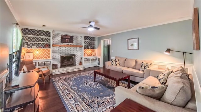 1721 Abbottsford Dr, Kernersville, NC 27284 - living room with a ceiling fan, dark wood-style floors, crown molding, and a fireplace