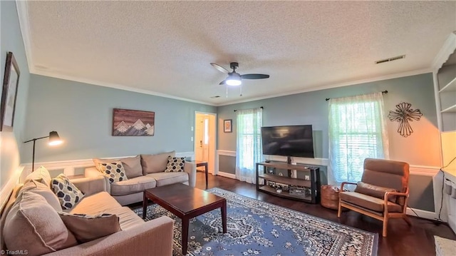 1721 Abbottsford Dr, Kernersville, NC 27284 - living room with a textured ceiling, a ceiling fan, wood finished floors, and ornamental molding