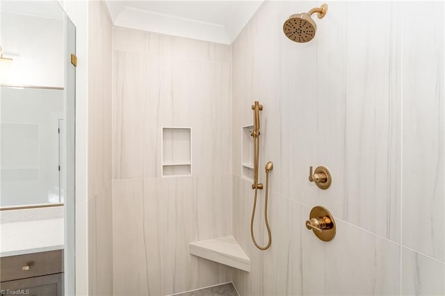 bathroom featuring tiled shower