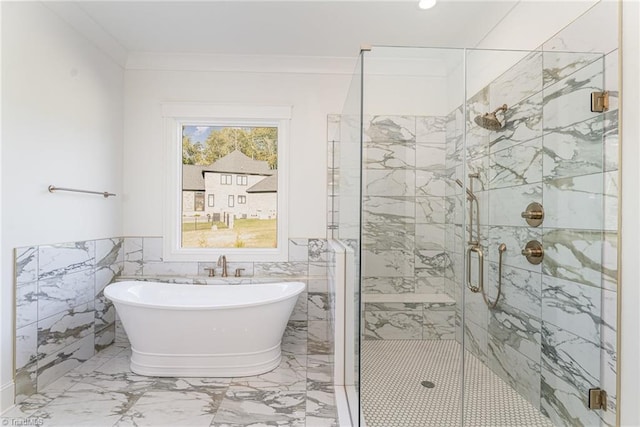 bathroom featuring separate shower and tub, tile walls, and crown molding