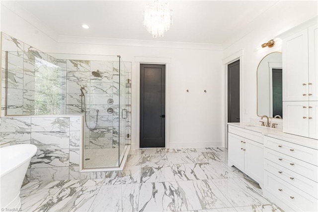 bathroom featuring ornamental molding, vanity, a notable chandelier, and independent shower and bath