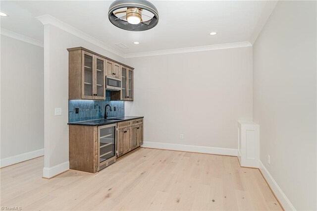 unfurnished living room featuring ornamental molding