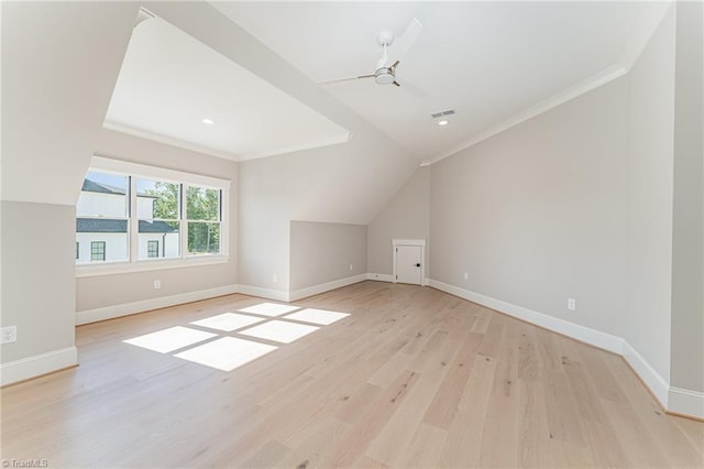 additional living space with ceiling fan, light hardwood / wood-style floors, and lofted ceiling