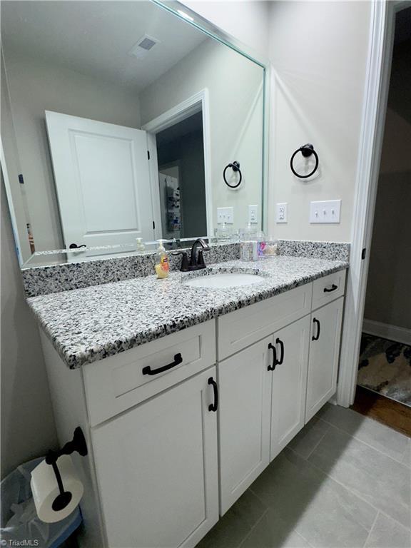 2968 Tobaccoville Rd, Tobaccoville, NC 27050 - bathroom with vanity and visible vents