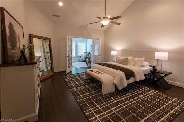 bedroom with ceiling fan, french doors, dark hardwood / wood-style flooring, and high vaulted ceiling