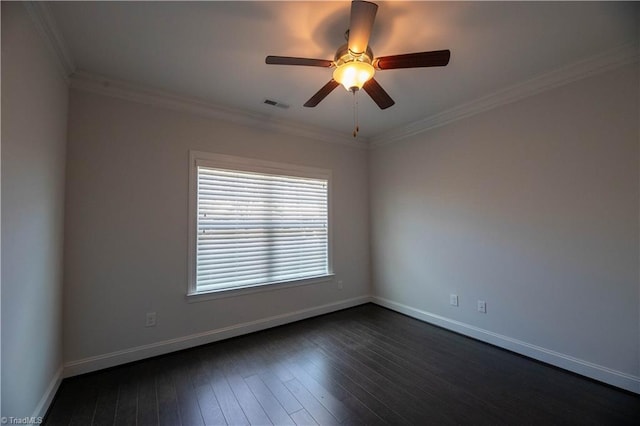 spare room with ceiling fan, crown molding, and dark hardwood / wood-style floors