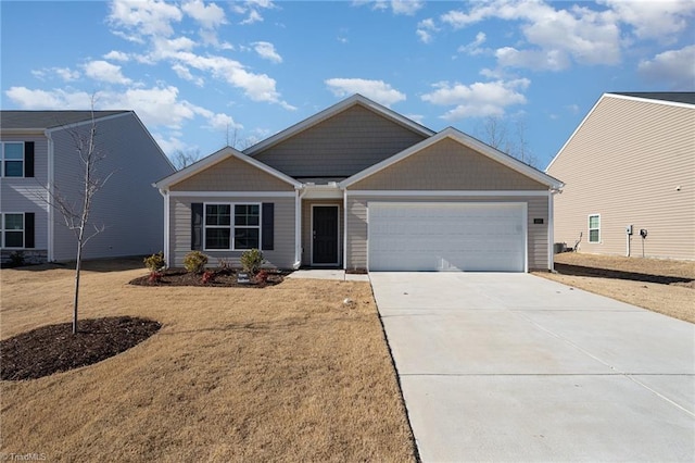 4997 Payne St, Trinity, NC 27370 - view of front facade featuring a garage, concrete driveway, and a front yard