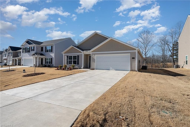 4997 Payne St, Trinity, NC 27370 - view of front of property with driveway, an attached garage, and central air condition unit