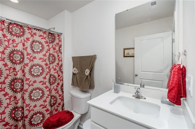 4997 Payne St, Trinity, NC 27370 - bathroom featuring vanity, toilet, and a shower with shower curtain