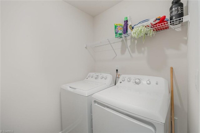 4997 Payne St, Trinity, NC 27370 - clothes washing area with independent washer and dryer