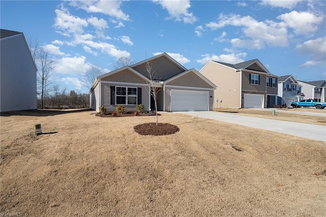 4997 Payne St, Trinity, NC 27370 - view of front of house with concrete driveway, a residential view, and an attached garage