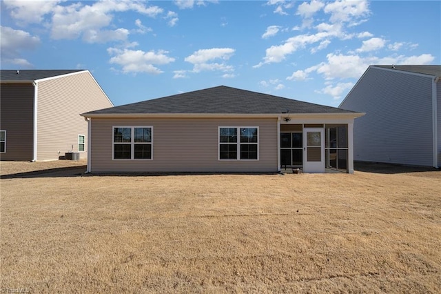 4997 Payne St, Trinity, NC 27370 - back of property with a sunroom and a lawn