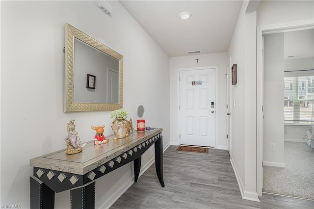 4997 Payne St, Trinity, NC 27370 - doorway to outside featuring wood finished floors and baseboards