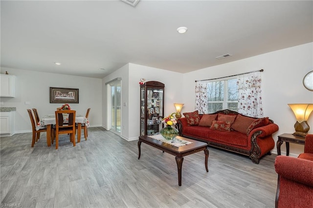 4997 Payne St, Trinity, NC 27370 - living area with light wood-type flooring, baseboards, and recessed lighting