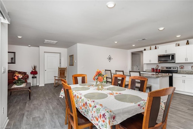4997 Payne St, Trinity, NC 27370 - dining space with wood finished floors and recessed lighting