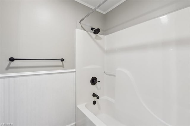 bathroom with shower / washtub combination