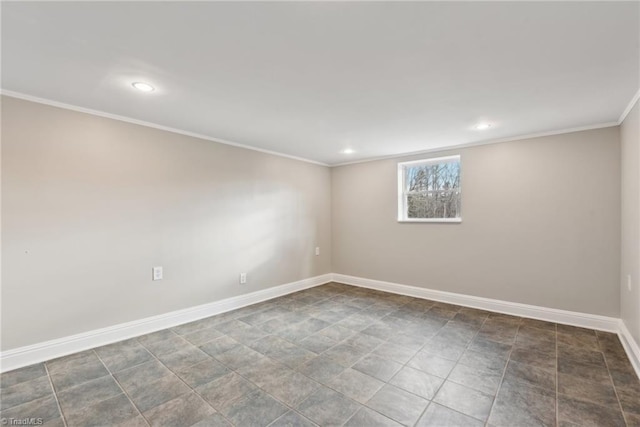 spare room featuring crown molding