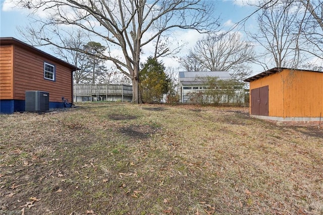 view of yard with central AC unit