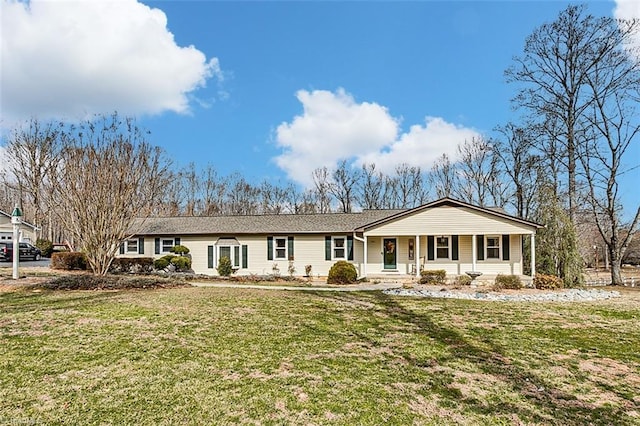 single story home featuring a front lawn and a porch