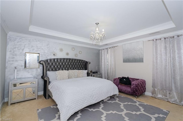 bedroom featuring a raised ceiling and ornamental molding