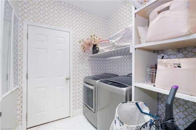 laundry area with washing machine and clothes dryer