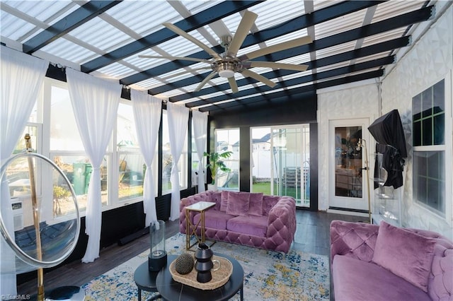 sunroom / solarium with ceiling fan and lofted ceiling