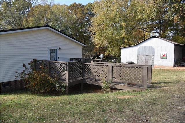 621 Southern Rd, King, NC 27021 - view of grassy yard with a deck and an outbuilding