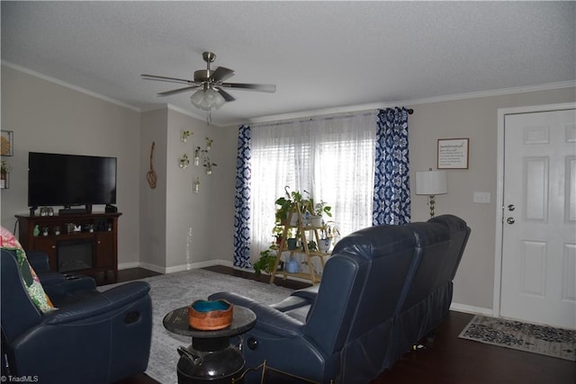 621 Southern Rd, King, NC 27021 - living area with a textured ceiling, ceiling fan, wood finished floors, and ornamental molding