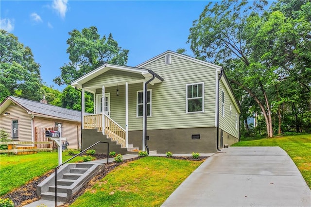 1732 Harrison Ave, Winston-Salem, NC 27105 - view of front of house with a front yard, stairs, and a porch