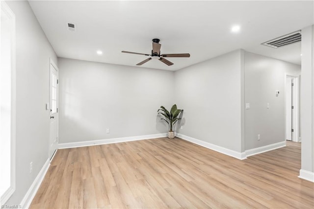 1732 Harrison Ave, Winston-Salem, NC 27105 - empty room with light wood-style flooring, a ceiling fan, and recessed lighting