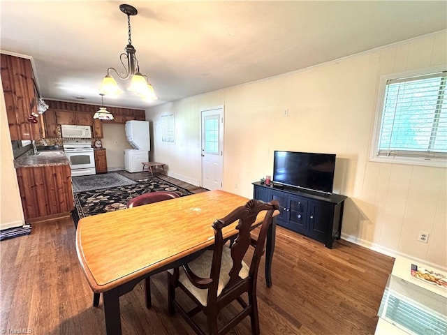 127 Forest Oaks Dr, Dobson, NC 27017 - dining area featuring dark wood finished floors, plenty of natural light, and baseboards