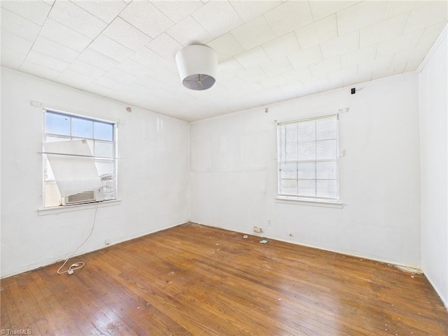 1008 E Brookline St, Winston-Salem, NC 27107 - spare room with wood-type flooring and cooling unit