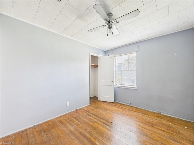 1008 E Brookline St, Winston-Salem, NC 27107 - unfurnished bedroom with wood-type flooring, ceiling fan, and a closet