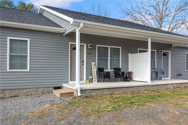 entrance to property featuring covered porch