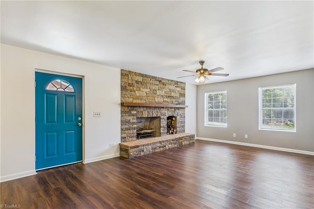 3640 Wyandotte Ave, Winston-Salem, NC 27127 - unfurnished living room with a ceiling fan, wood finished floors, and a fireplace