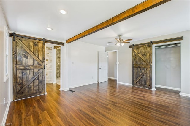3640 Wyandotte Ave, Winston-Salem, NC 27127 - unfurnished living room with a barn door, a ceiling fan, wood finished floors, recessed lighting, and beamed ceiling