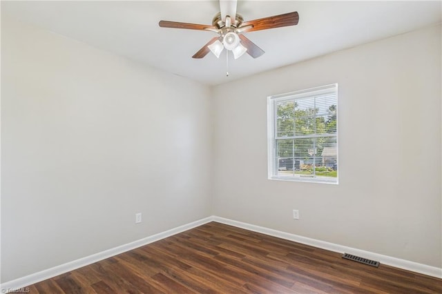 3640 Wyandotte Ave, Winston-Salem, NC 27127 - spare room with dark wood-style flooring and a ceiling fan