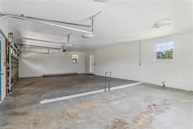 3640 Wyandotte Ave, Winston-Salem, NC 27127 - garage with a garage door opener and concrete block wall