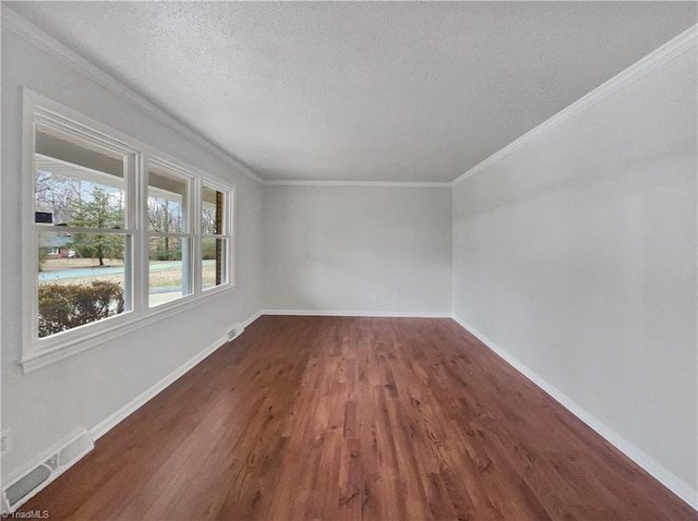 unfurnished room featuring baseboards and ornamental molding