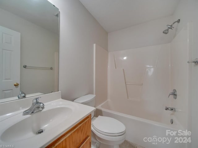 full bathroom featuring vanity, toilet, and shower / washtub combination