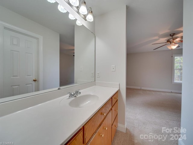 bathroom featuring vanity and ceiling fan