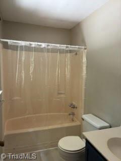 3569 Merry Ridge Rd, Tobaccoville, NC 27050 - full bathroom with shower / bathtub combination with curtain, vanity, and toilet