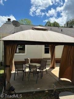 3569 Merry Ridge Rd, Tobaccoville, NC 27050 - back of property featuring a gazebo and a patio area