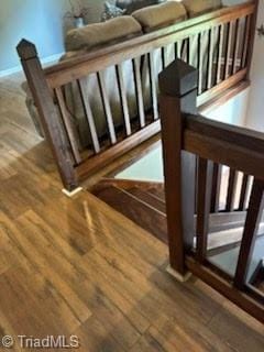 3569 Merry Ridge Rd, Tobaccoville, NC 27050 - stairway featuring wood finished floors