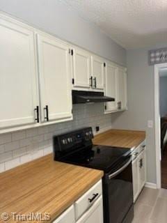 3569 Merry Ridge Rd, Tobaccoville, NC 27050 - kitchen with black range with electric cooktop, under cabinet range hood, white cabinets, backsplash, and a textured ceiling