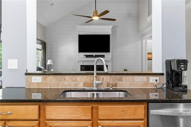 8483 Austin Hill Ln, Tobaccoville, NC 27050 - kitchen featuring dishwasher, open floor plan, lofted ceiling, dark stone countertops, and a ceiling fan