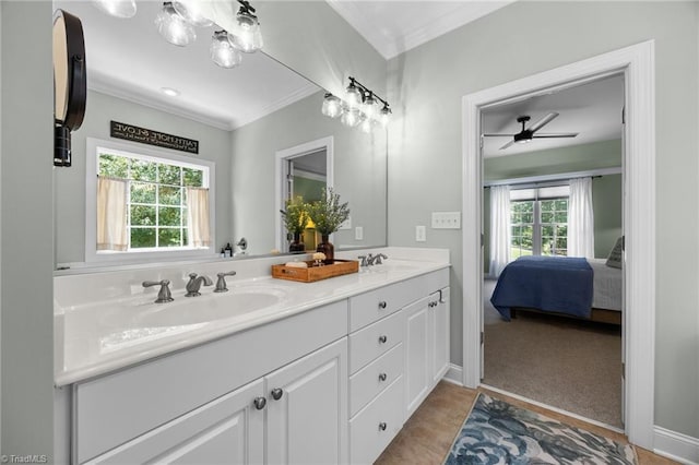 8483 Austin Hill Ln, Tobaccoville, NC 27050 - ensuite bathroom with ornamental molding, double vanity, healthy amount of natural light, and a ceiling fan