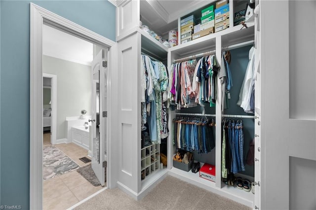 8483 Austin Hill Ln, Tobaccoville, NC 27050 - walk in closet featuring tile patterned flooring