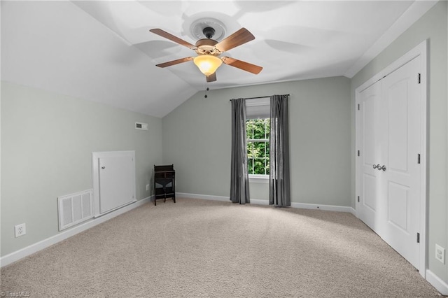 8483 Austin Hill Ln, Tobaccoville, NC 27050 - bonus room with ceiling fan, vaulted ceiling, and light colored carpet